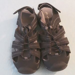 Eddie Bauer buys sandals dark and light grey.